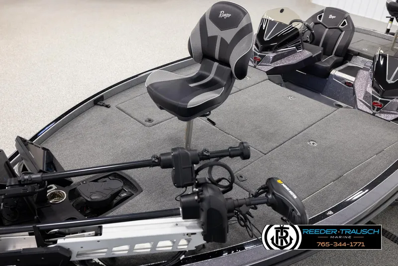 Slide: The Image of 2023 Ranger Z 521R fishing boat interior with seating and equipment, Reeder Trausch Marine branding. - 9