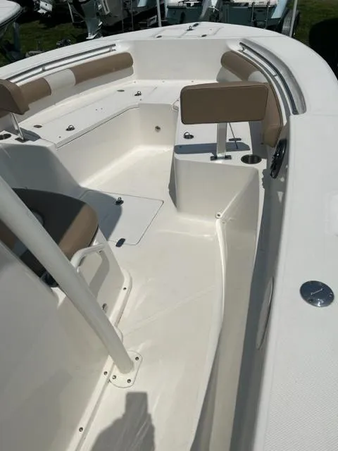 Slide: The Image of 2024 Sea Born LX24 Center Console boat with spacious seating and sleek design. - 17
