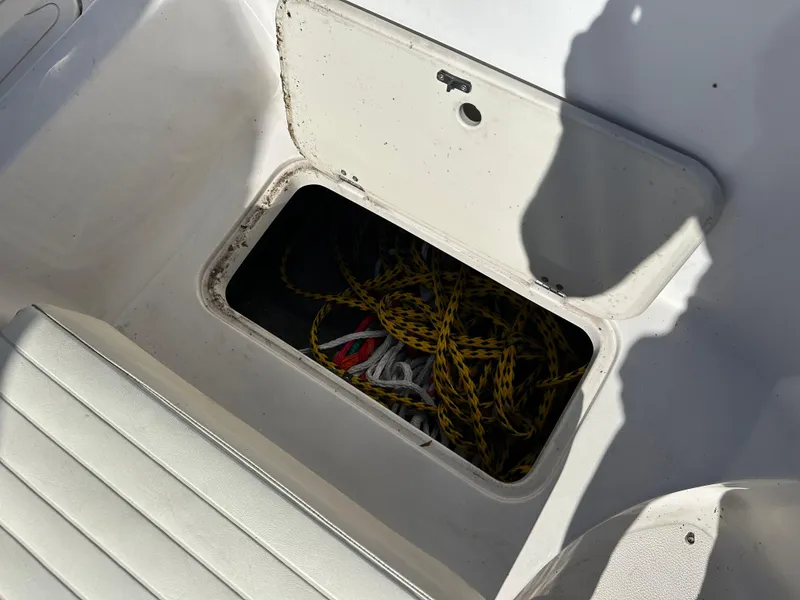 Slide: The Image of Storage compartment with ropes on a 2007 Smoker Craft Vectra 2042 OB boat. - 10