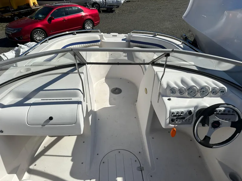Slide: The Image of 2007 Smoker Craft Vectra 2042 OB boat interior with steering wheel and dashboard gauges. - 16