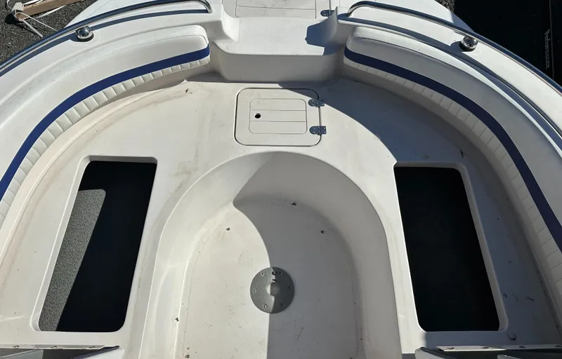 Slide: The Image of 2007 Smoker Craft Vectra 2042 OB boat interior with seating and storage compartments. - 18