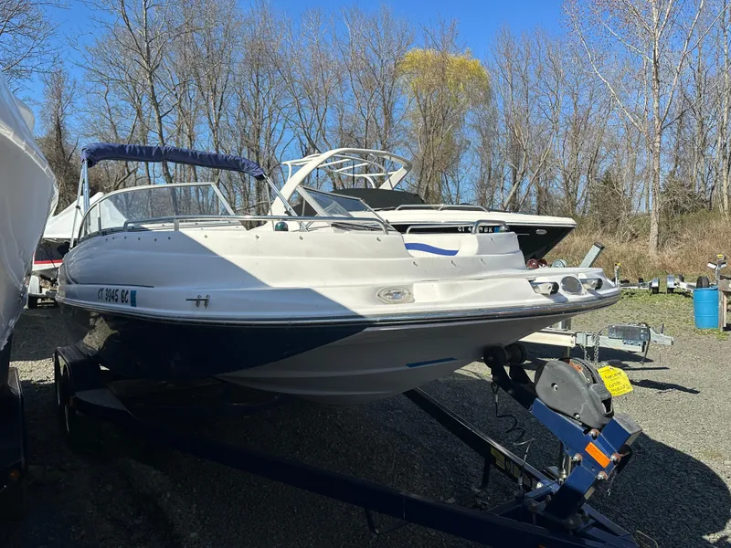 Slide: The Image of 2007 Smoker Craft Vectra 2042 OB boat on trailer, parked outdoors. - 4