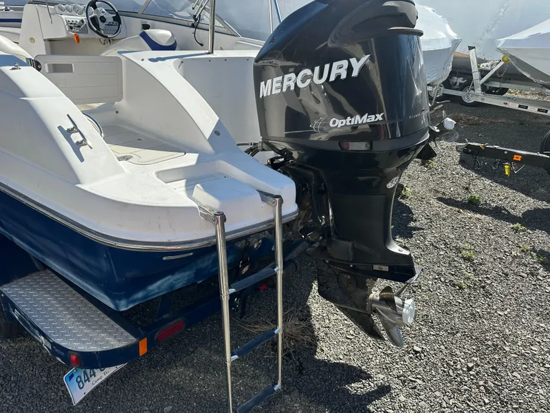 Slide: The Image of 2007 Smoker Craft Vectra 2042 OB boat with Mercury OptiMax outboard motor. - 5