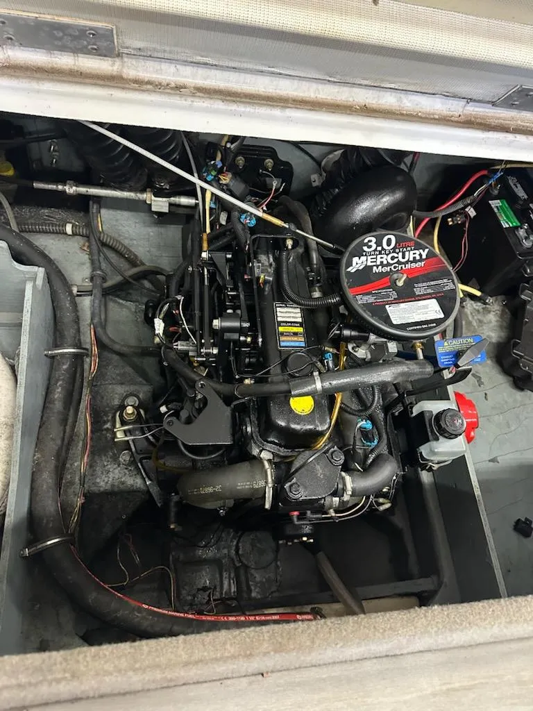 Slide: The Image of 2008 Bayliner 185 engine compartment with 3.0 Mercury MerCruiser engine. - 8