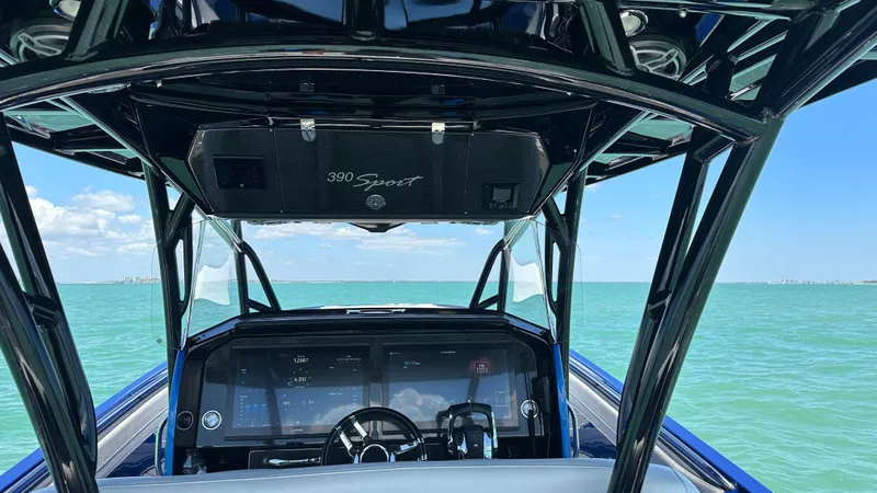 Slide: The Image of 2020 Nor-Tech 390 Sport boat dashboard with ocean view. - 29