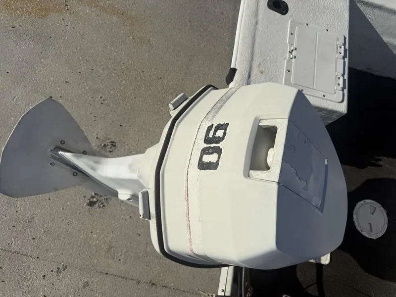 Slide: The Image of Outboard motor on a 1997 Polar 17 CC boat, viewed from above. - 12