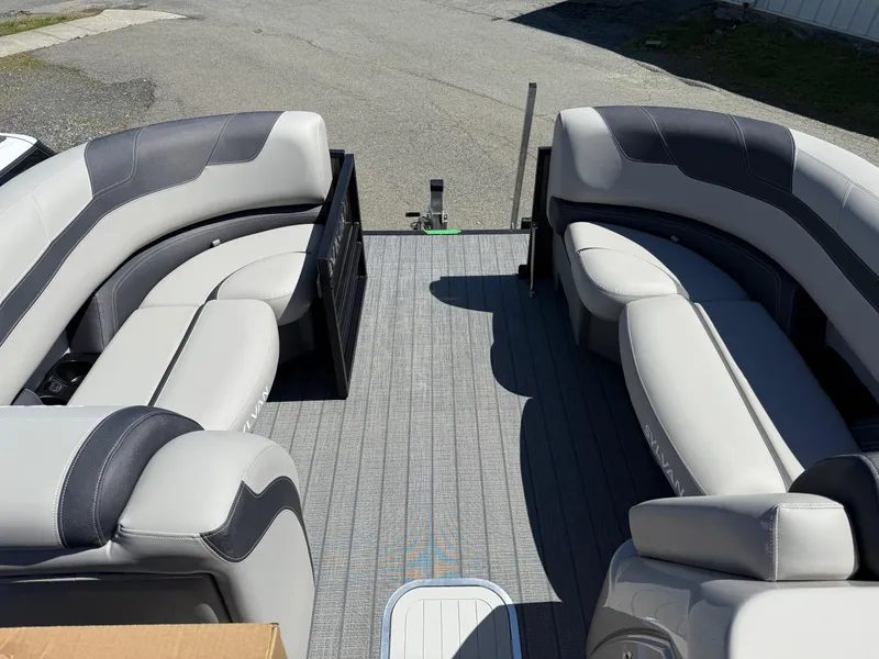 Slide: The Image of 2025 Sylvan L-3 CLZ pontoon boat interior with gray seating and flooring. - 10