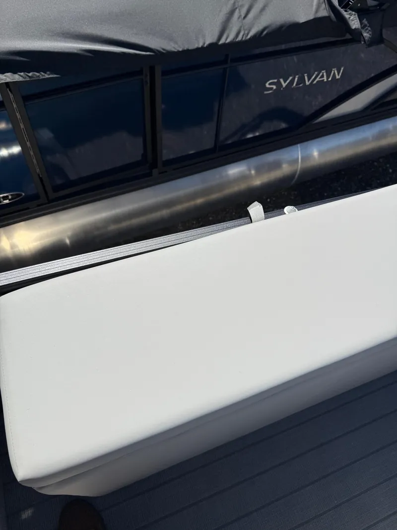 Slide: The Image of 2025 Sylvan L-3 CLZ boat with sleek design and white seating. - 12