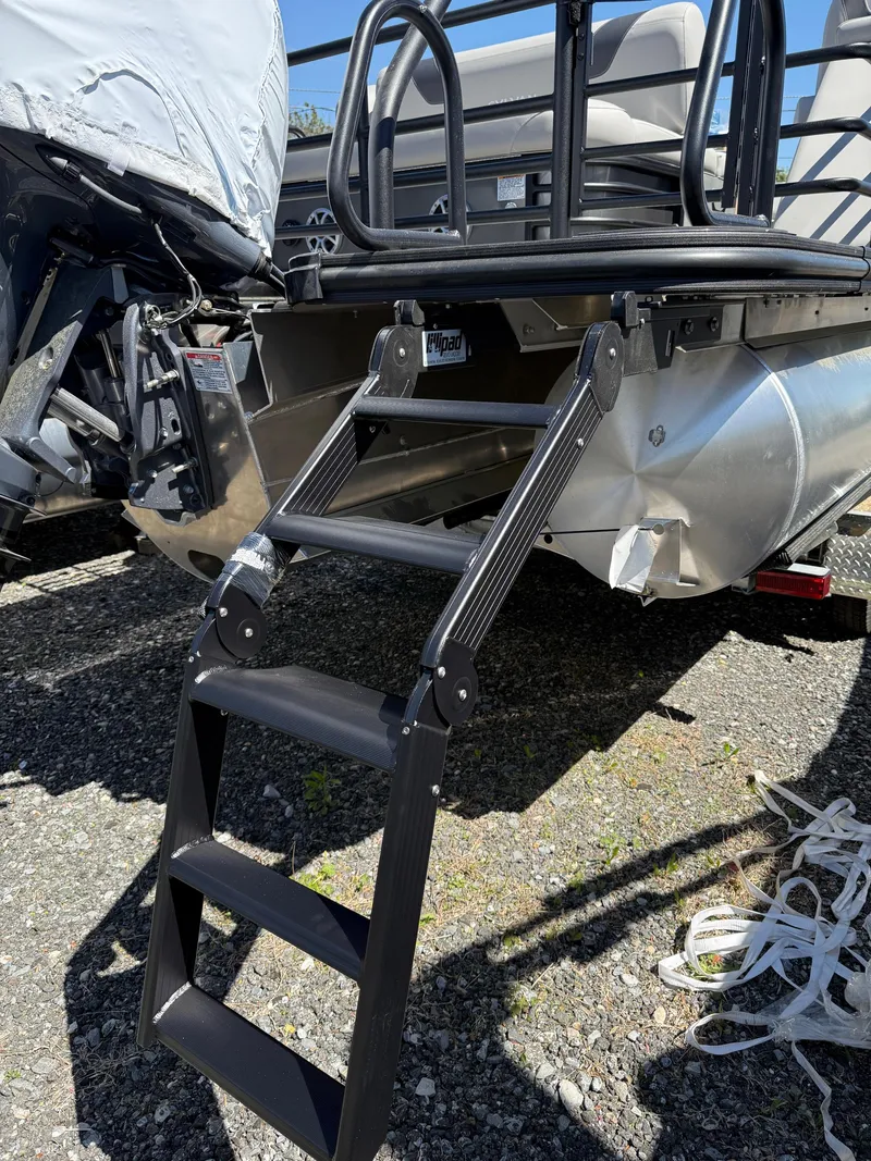 Slide: The Image of 2025 Sylvan L-3 CLZ pontoon boat with rear boarding ladder. - 14