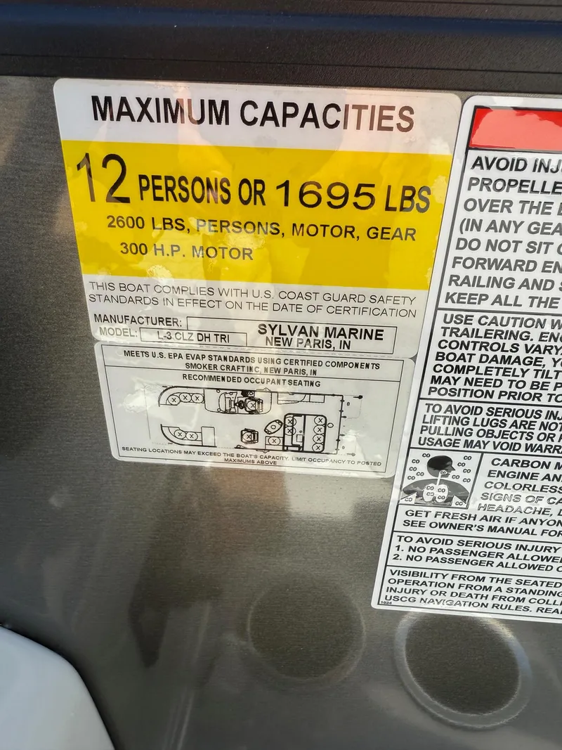 Slide: The Image of 2025 Sylvan L-3 CLZ capacity label: 12 persons or 1695 lbs, 300 HP motor. - 17