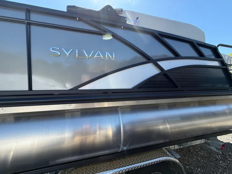 Slide: The Image of 2025 Sylvan L-3 CLZ pontoon boat with sleek metallic design. - 3