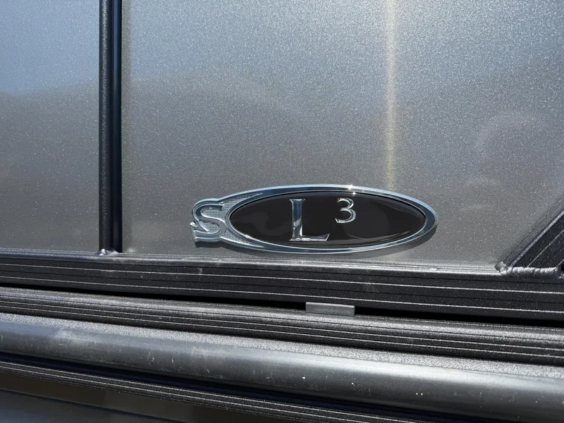 Slide: The Image of 2025 Sylvan L-3 CLZ emblem on metallic surface, close-up view. - 4