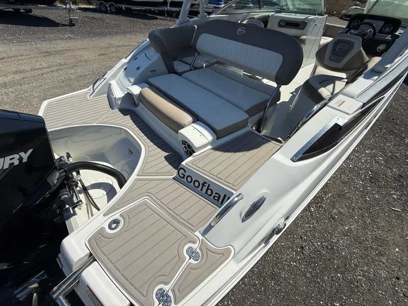 Slide: The Image of 2022 Crownline Eclipse E235 XS boat with spacious seating and Mercury engine. - 19