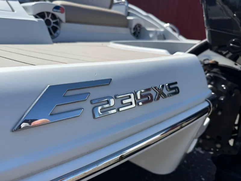 Slide: The Image of 2022 Crownline Eclipse E235 XS boat, rear view with model emblem. - 24