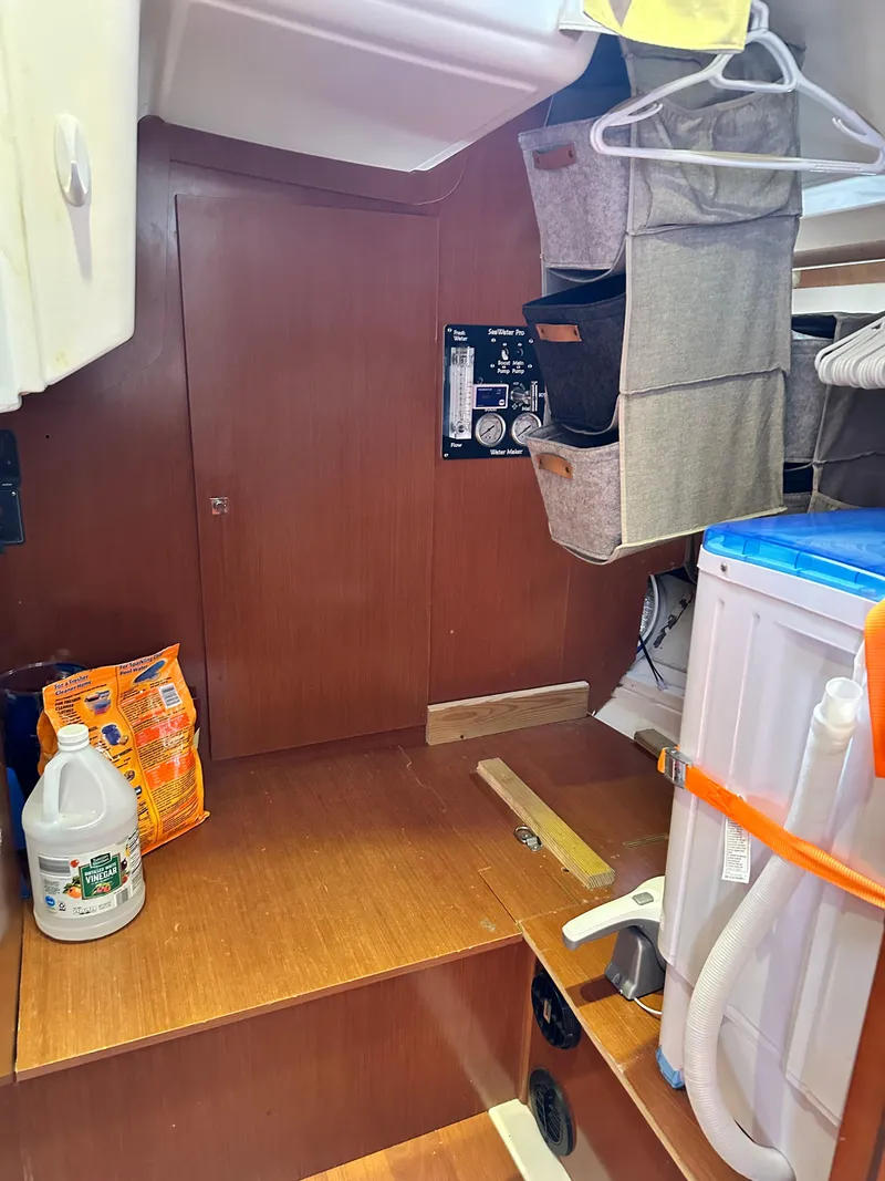 Slide: The Image of Interior of 2012 Beneteau Oceanis 41 sailboat with storage and equipment. - 33