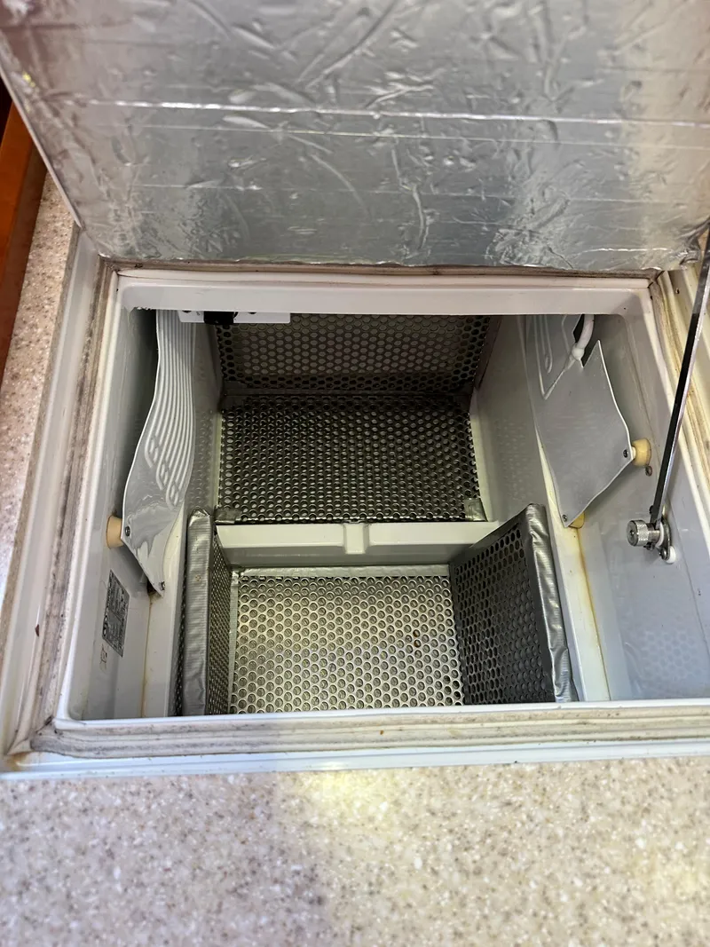 Slide: The Image of Open storage compartment on a 2012 Beneteau Oceanis 41 sailboat. - 40