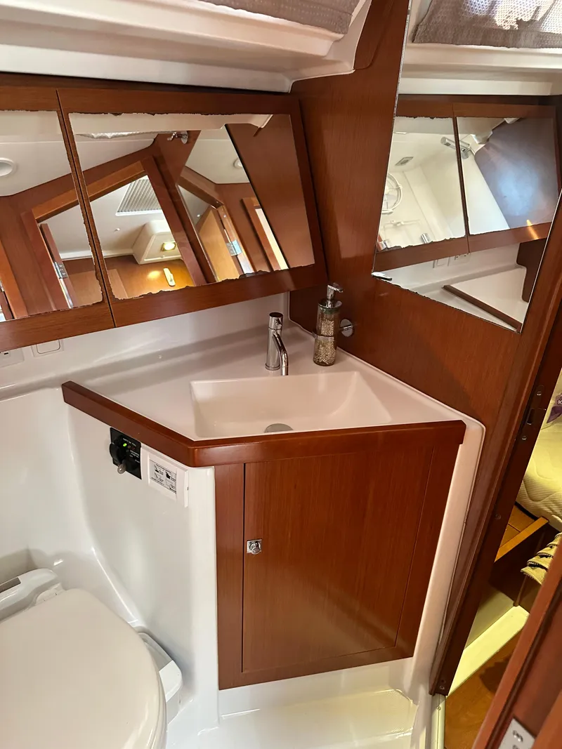 Slide: The Image of Beneteau Oceanis 41 bathroom with wooden cabinetry and modern sink, 2012 model. - 43