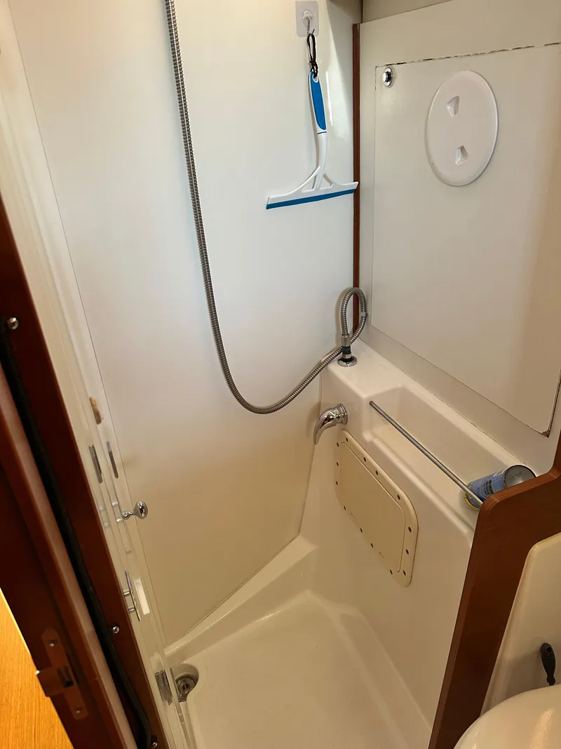 Slide: The Image of Beneteau Oceanis 41 (2012) yacht bathroom with shower and squeegee. - 45