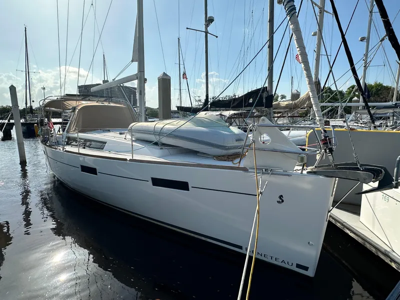 Slide: The Image of 2012 Beneteau Oceanis 41 sailboat docked in marina, sunny day, side view. - 78