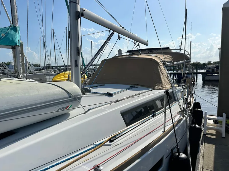 Slide: The Image of Beneteau Oceanis 41 sailboat docked at marina, 2012 model, with clear sky background. - 81