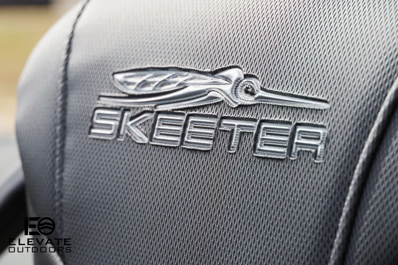 Slide: The Image of Close-up of 2025 Skeeter ZXR 20 logo on textured surface. - 10