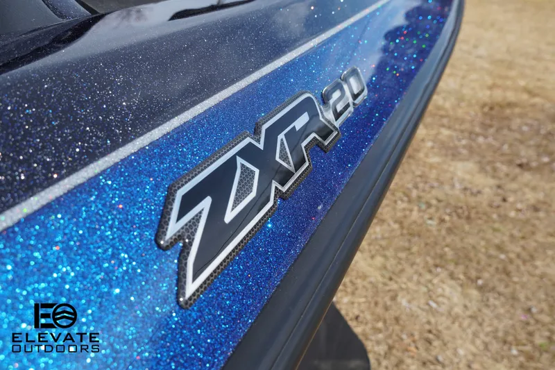 Slide: The Image of 2025 Skeeter ZXR 20 boat with glittery blue finish and logo detail. - 15