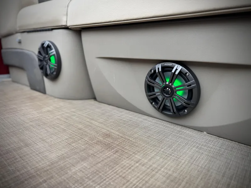 Slide: The Image of 2021 Sun Tracker Party Barge 22 DLX XP3 interior with illuminated speakers. - 11