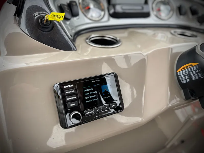 Slide: The Image of 2021 Sun Tracker Party Barge 22 DLX XP3 dashboard with stereo system and controls. - 20