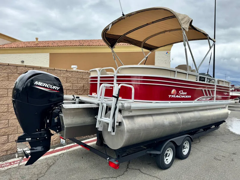 Slide: The Image of 2021 Sun Tracker Party Barge 22 DLX XP3 pontoon boat with Mercury outboard motor. - 6
