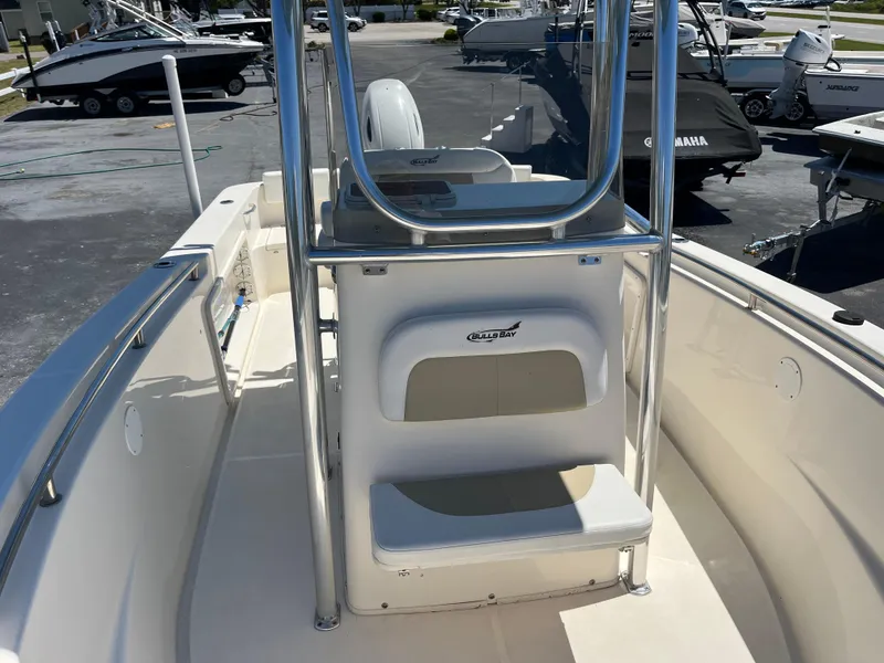 Slide: The Image of 2020 Bulls Bay 230 Center Console boat interior with seating and console view. - 18