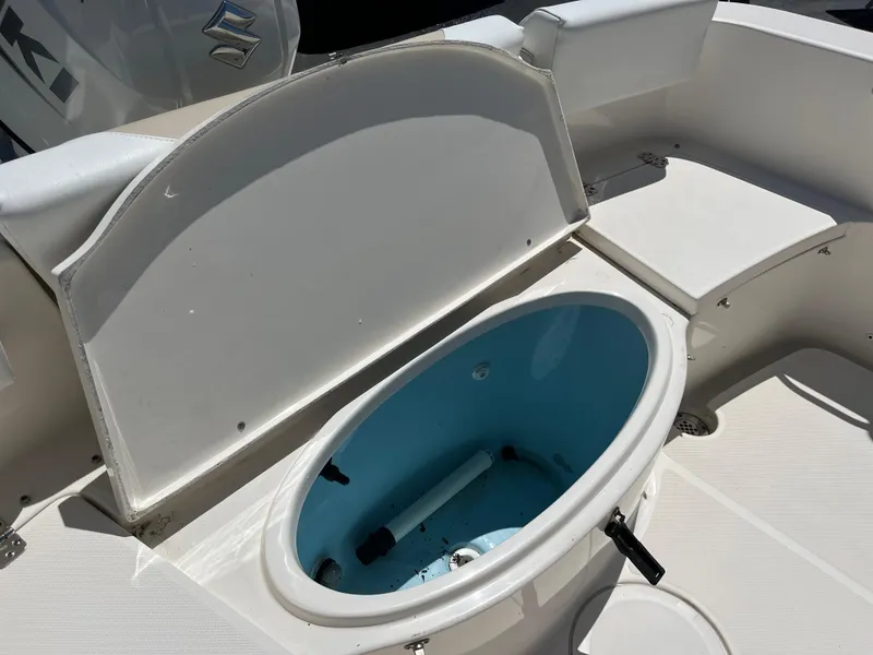 Slide: The Image of 2020 Bulls Bay 230 Center Console boat with open livewell. - 24