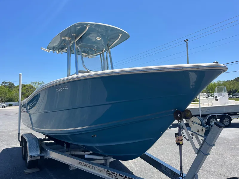 Slide: The Image of 2020 Bulls Bay 230 Center Console boat on trailer under clear blue sky. - 7
