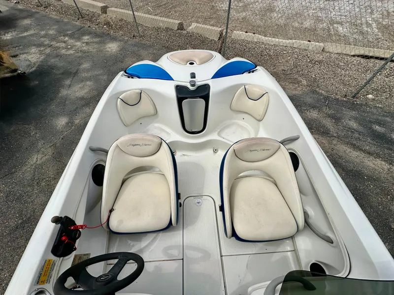 Slide: The Image of 2007 Tango Super Sport boat interior with dual seats and steering wheel. - 7