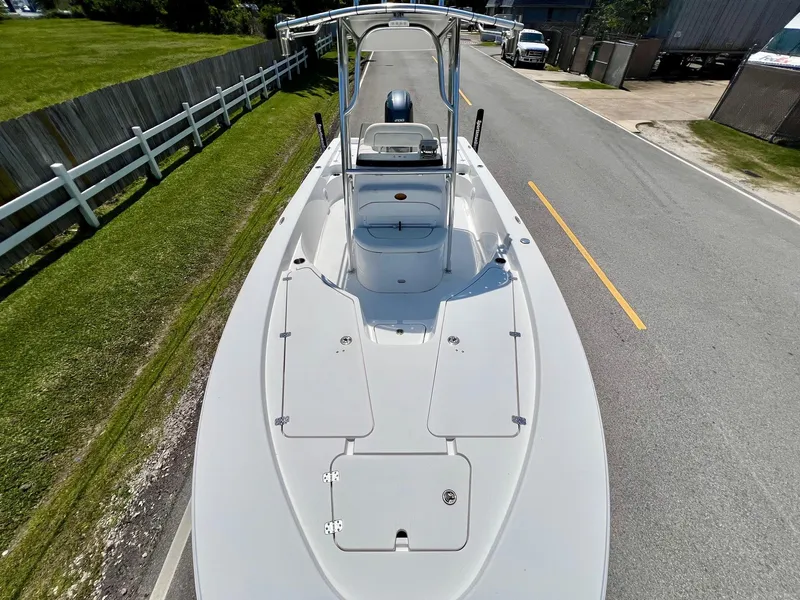 Slide: The Image of 2013 Sportsman Masters 227 Bay Boat on a road, top view. - 16