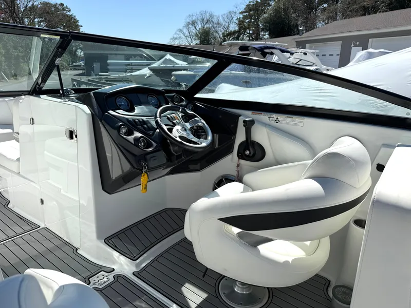 Slide: The Image of 2014 Monterey M5 Sport Boat cockpit with sleek design and modern controls. - 10