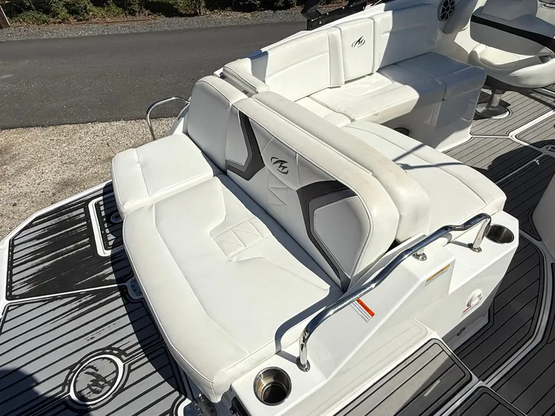 Slide: The Image of 2014 Monterey M5 Sport Boat with white seating and sleek design. - 20
