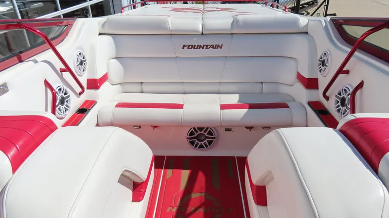 Slide: The Image of 2002 Fountain 47 Lightning boat interior with white and red seating, featuring branded upholstery. - 35