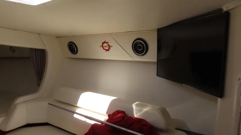 Slide: The Image of Interior of 2002 Fountain 47 Lightning boat with TV and speakers. - 36