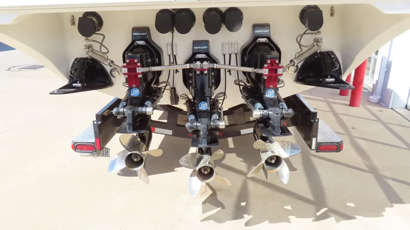 Slide: The Image of Rear view of 2002 Fountain 47 Lightning boat with triple propellers. - 39