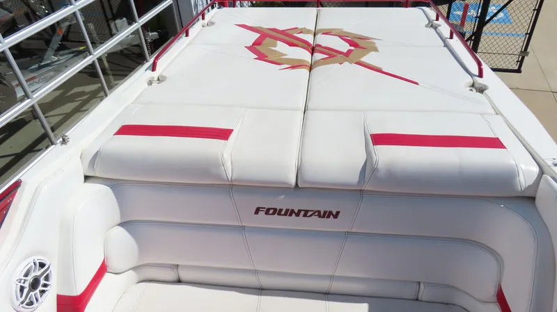 Slide: The Image of 2002 Fountain 47 Lightning boat interior with red accents and logo. - 4