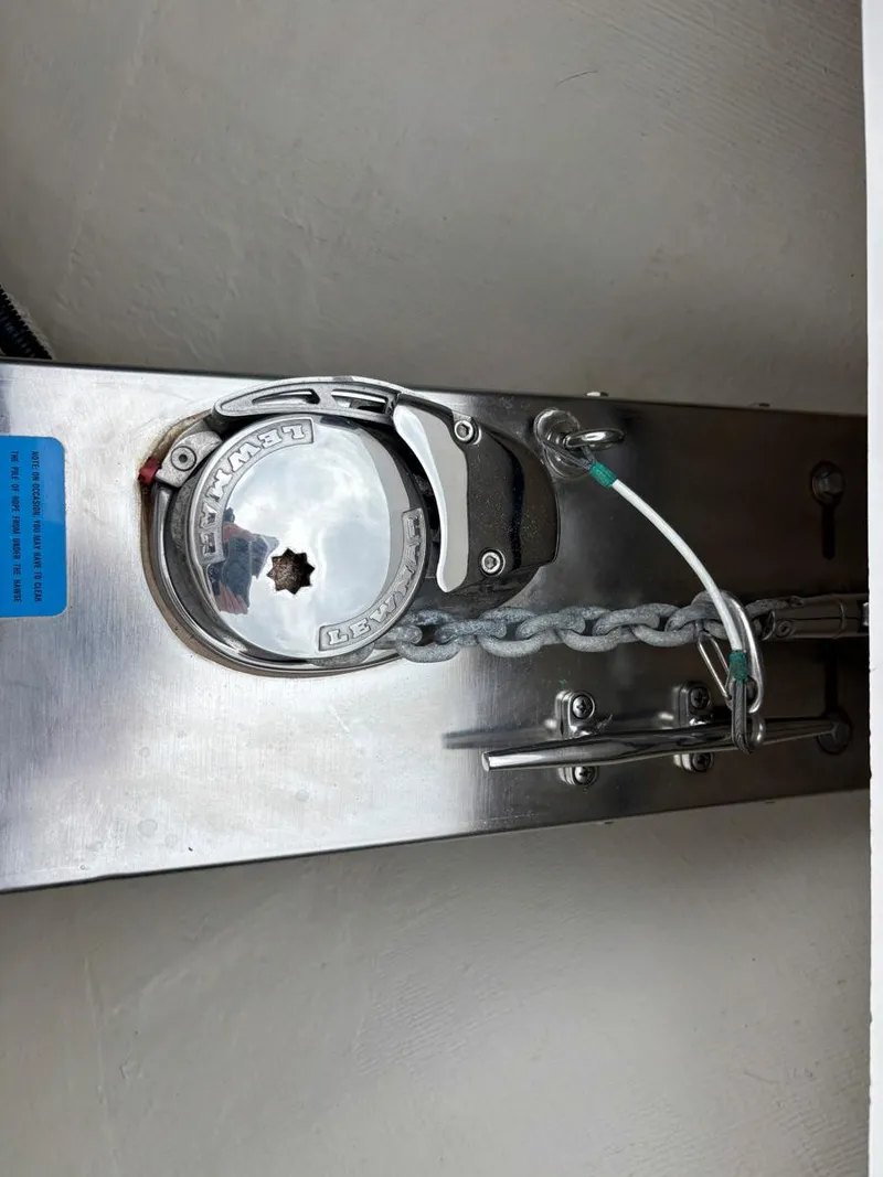 Slide: The Image of 2018 Regulator 28 boat anchor chain mechanism with stainless steel components. - 17