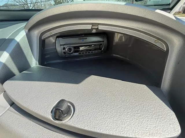 Slide: The Image of Glove compartment of 2008 Monterey 194FS boat with stereo system. - 13