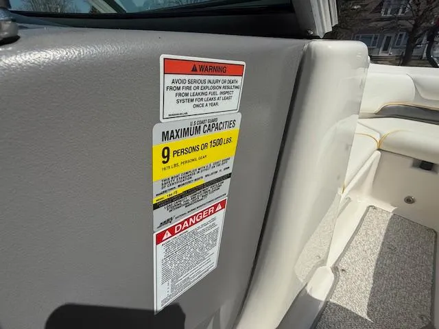 Slide: The Image of Warning labels on 2008 Monterey 194FS boat, indicating maximum capacity of 9 persons or 1500 lbs. - 15