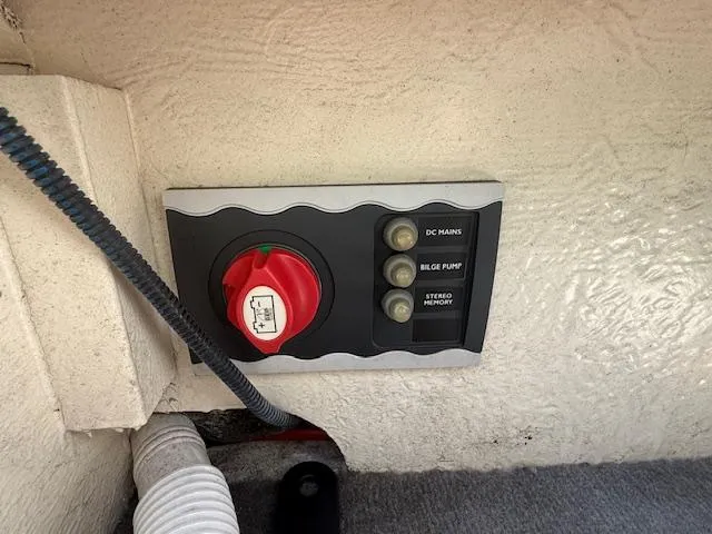 Slide: The Image of Control panel of a 2008 Monterey 194FS boat with switches and wiring. - 25