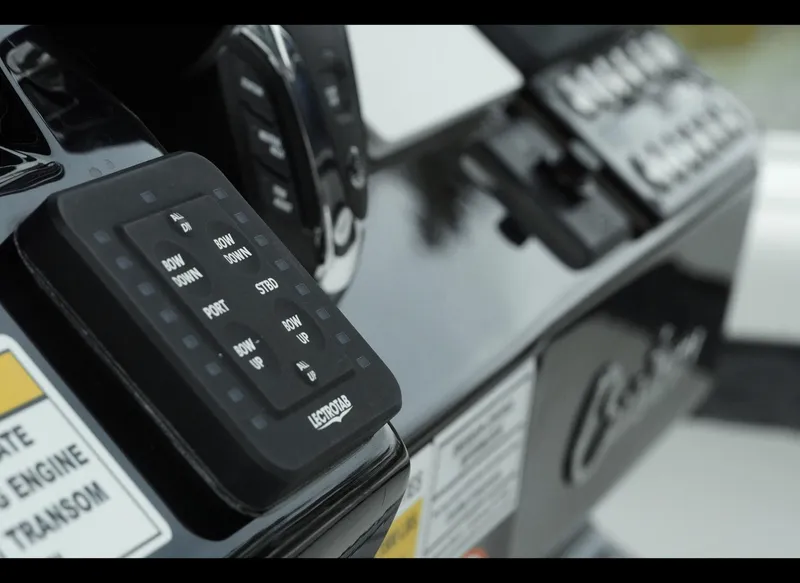 Slide: The Image of Control panel of 2025 Tidewater 2500 Carolina Bay boat, featuring advanced navigation system. - 15