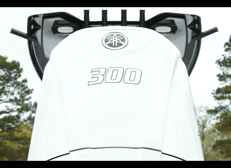 Slide: The Image of 2025 Tidewater 2500 Carolina Bay boat with Yamaha 300 engine, rear view. - 4