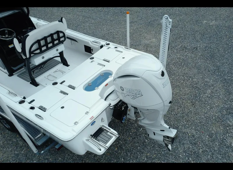Slide: The Image of 2025 Tidewater 2500 Carolina Bay boat with Yamaha outboard engine, viewed from above. - 6