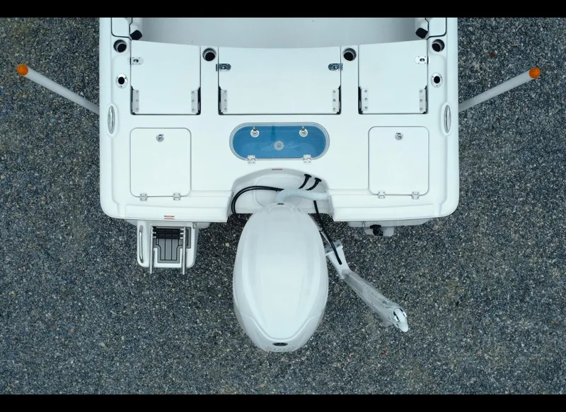 Slide: The Image of 2025 Tidewater 2500 Carolina Bay boat, aerial view of deck and motor. - 8