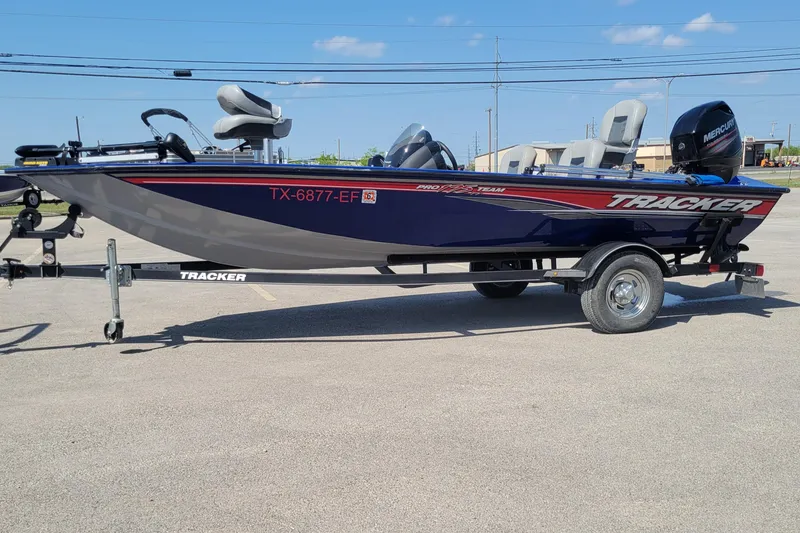 Slide: The Image of 2018 Tracker Pro Team 175TF fishing boat on trailer in parking lot. - 4