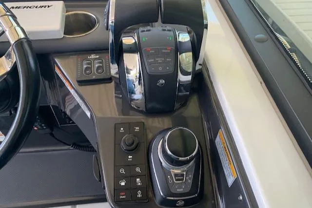 Slide: The Image of Control panel of a 2017 Monterey 378 SE boat with advanced navigation features. - 18